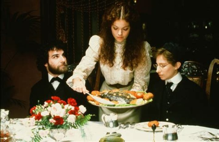 Amy Irving giving a pose along with her husband, Kenneth Bowser Jr.