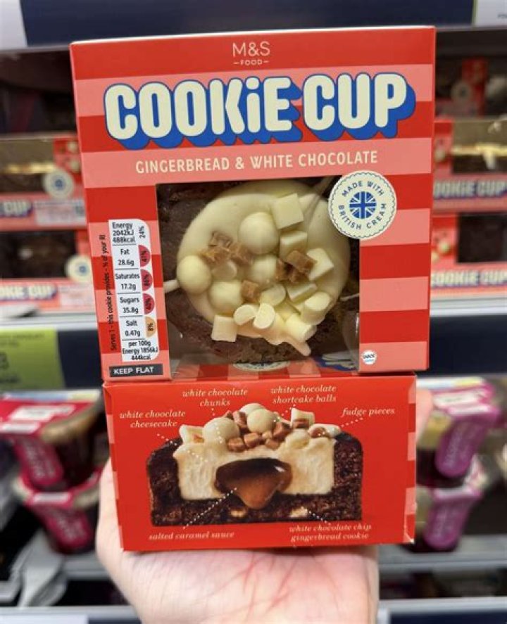 Gingerbread cookie cup in a muffin pan.