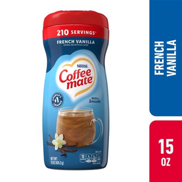 Vanilla coffee creamer in a small glass pitcher.